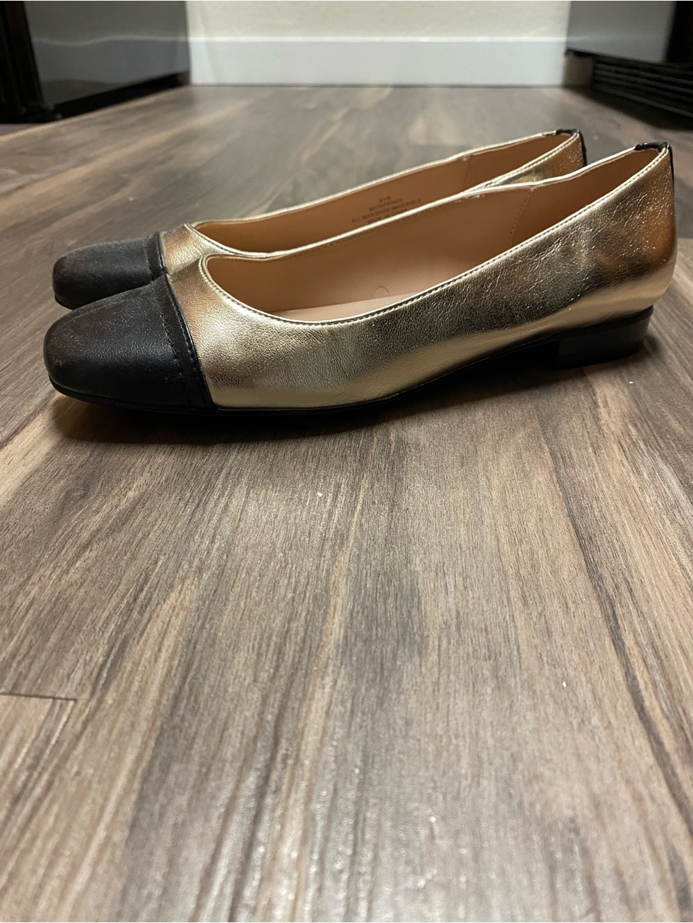 Bandolino Gold and Black Cap Toe Ballet Flats